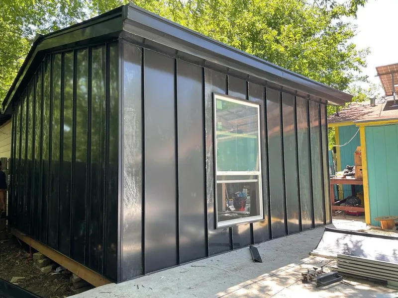 Black standing seam metal wall panels for Metal Roof Installation in Townsend