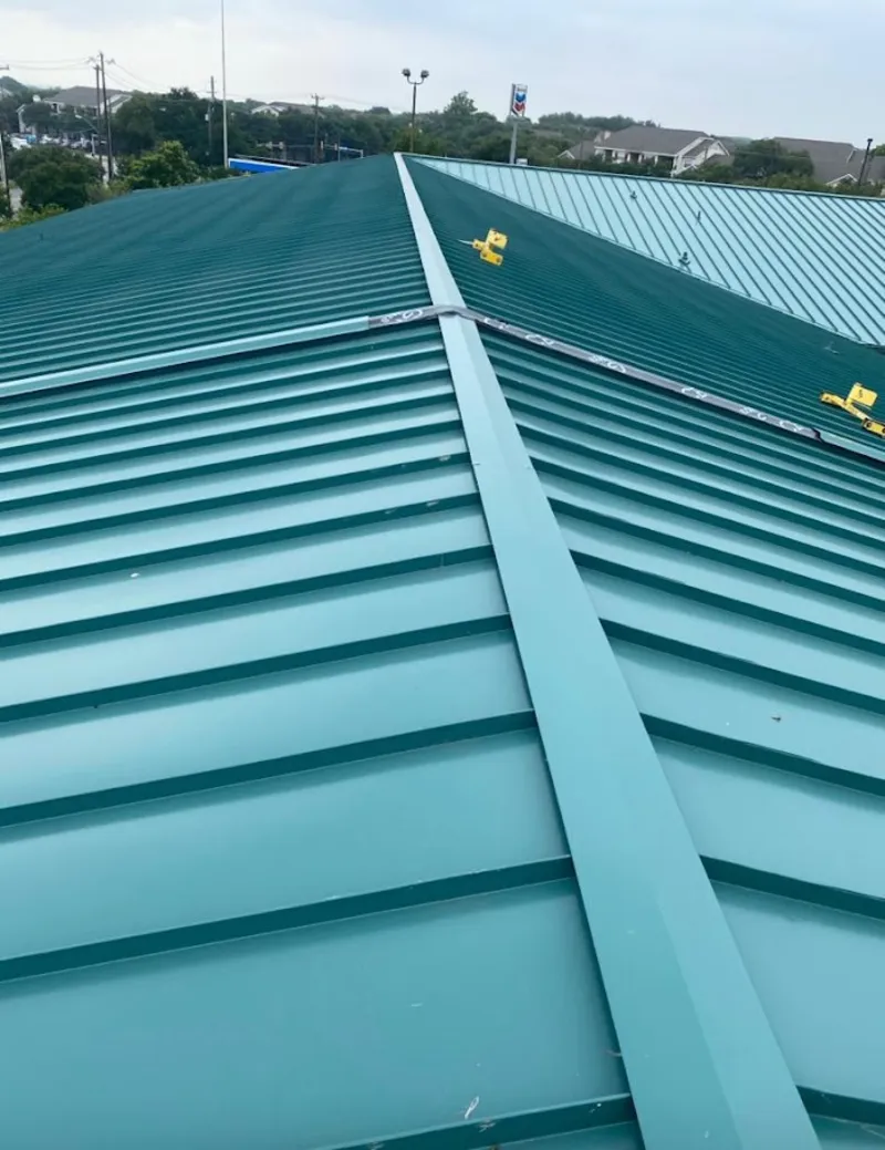 Green commercial metal roof ridge and valley for Metal Roof Repair in Townsend