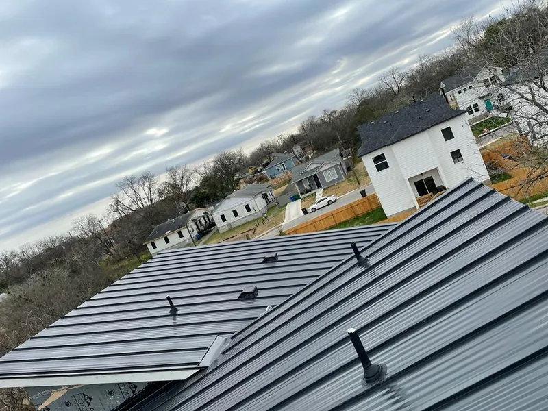 Standing seam metal roof panels with vents for Skylight Repair in Townsend